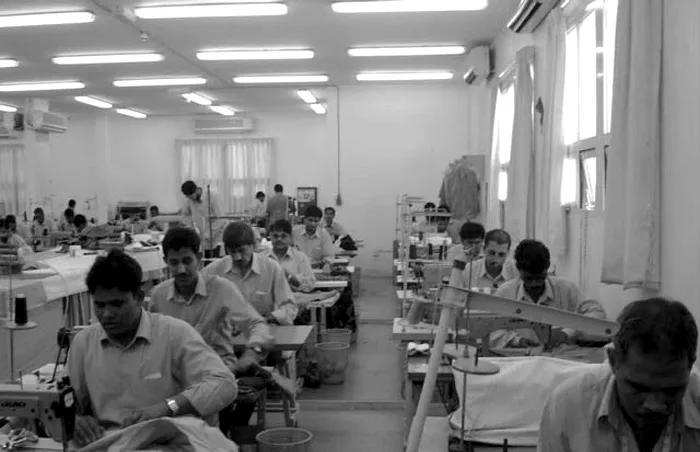 Rows of machinists at work in the TSC workshop