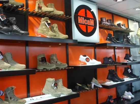 Shelves of desert and black military boots